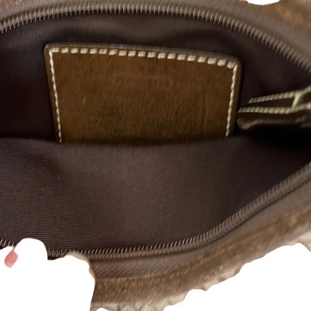 ￼ Coach, Crossbody mini bag with suede bottom